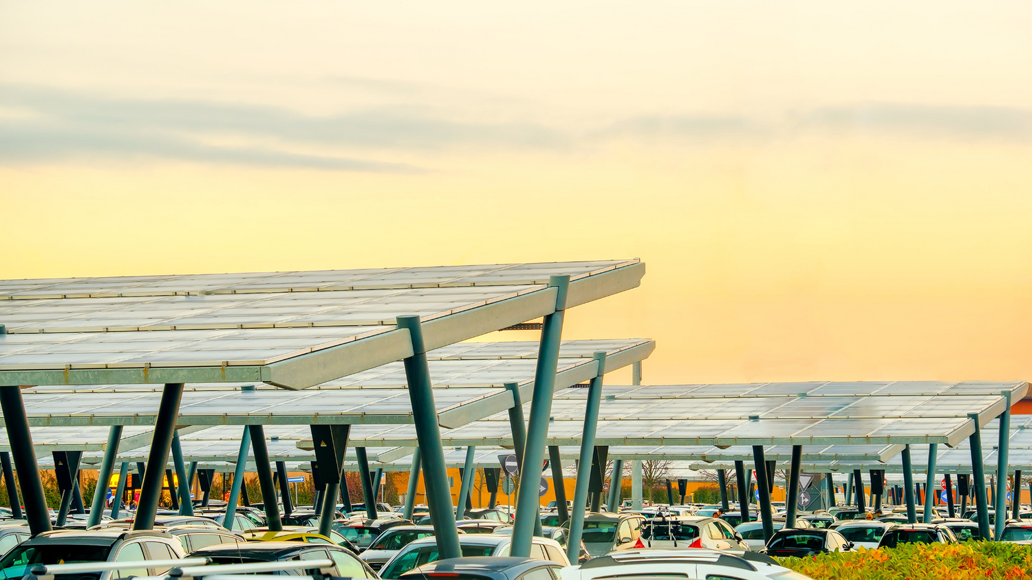 Turning parking lots into EV charging lots with direct-connected DC-to-DC solar canopies